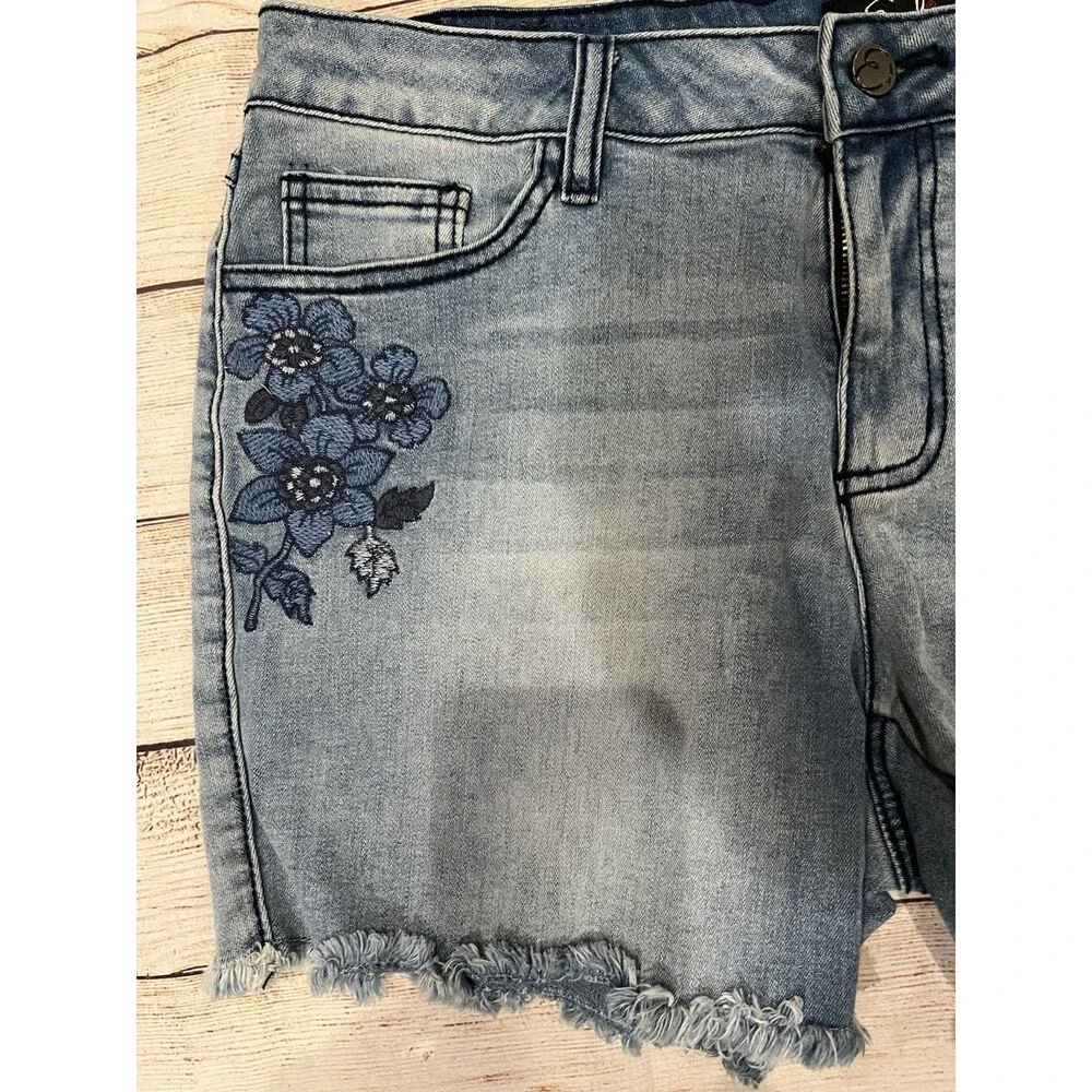 Earl Jean mid-rise denim shorts with blue floral embroidery and a frayed hem 12